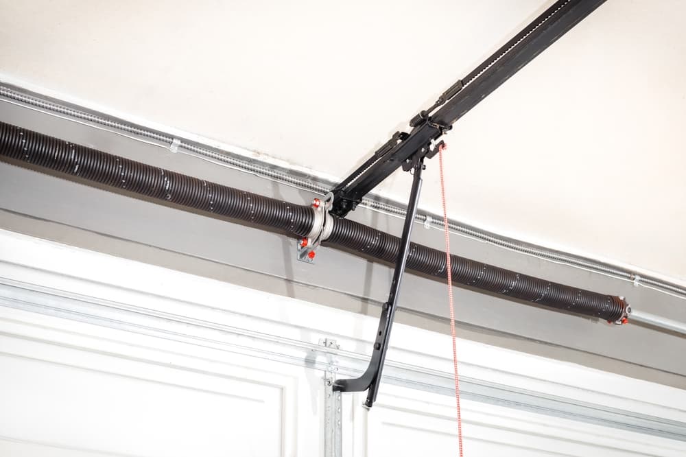 Torsion spring repair and replacement for a Calgary garage door