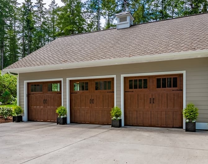 Overhead garage door spring cable and opener repair in Calgary