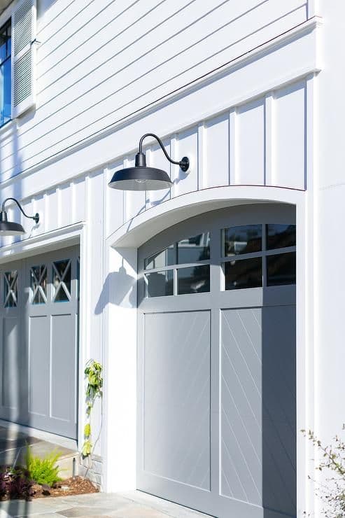 Experienced Calgary garage door technician repairing a residential garage door